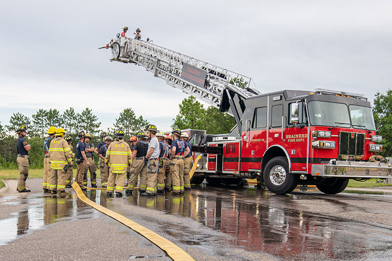 Fire truck and firefighters