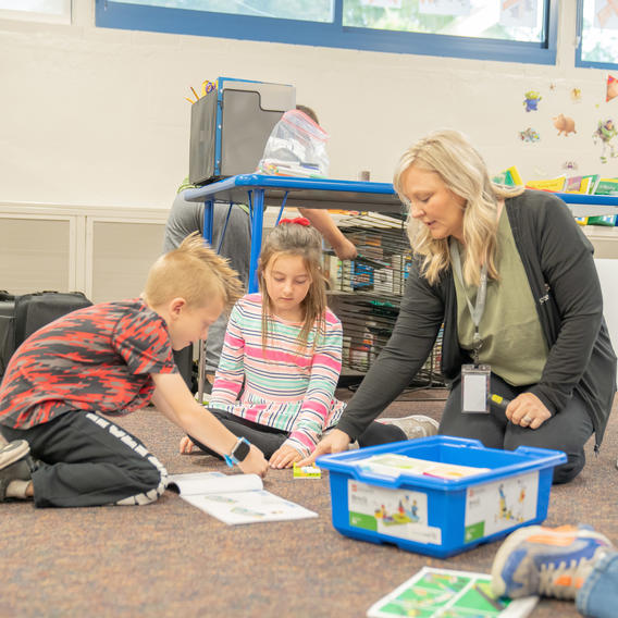 STEMbound consultant with students